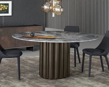 Tavolo Dorian Table con top in marmo e base in poliuretano finitura bronzo spazzolato di Bonaldo